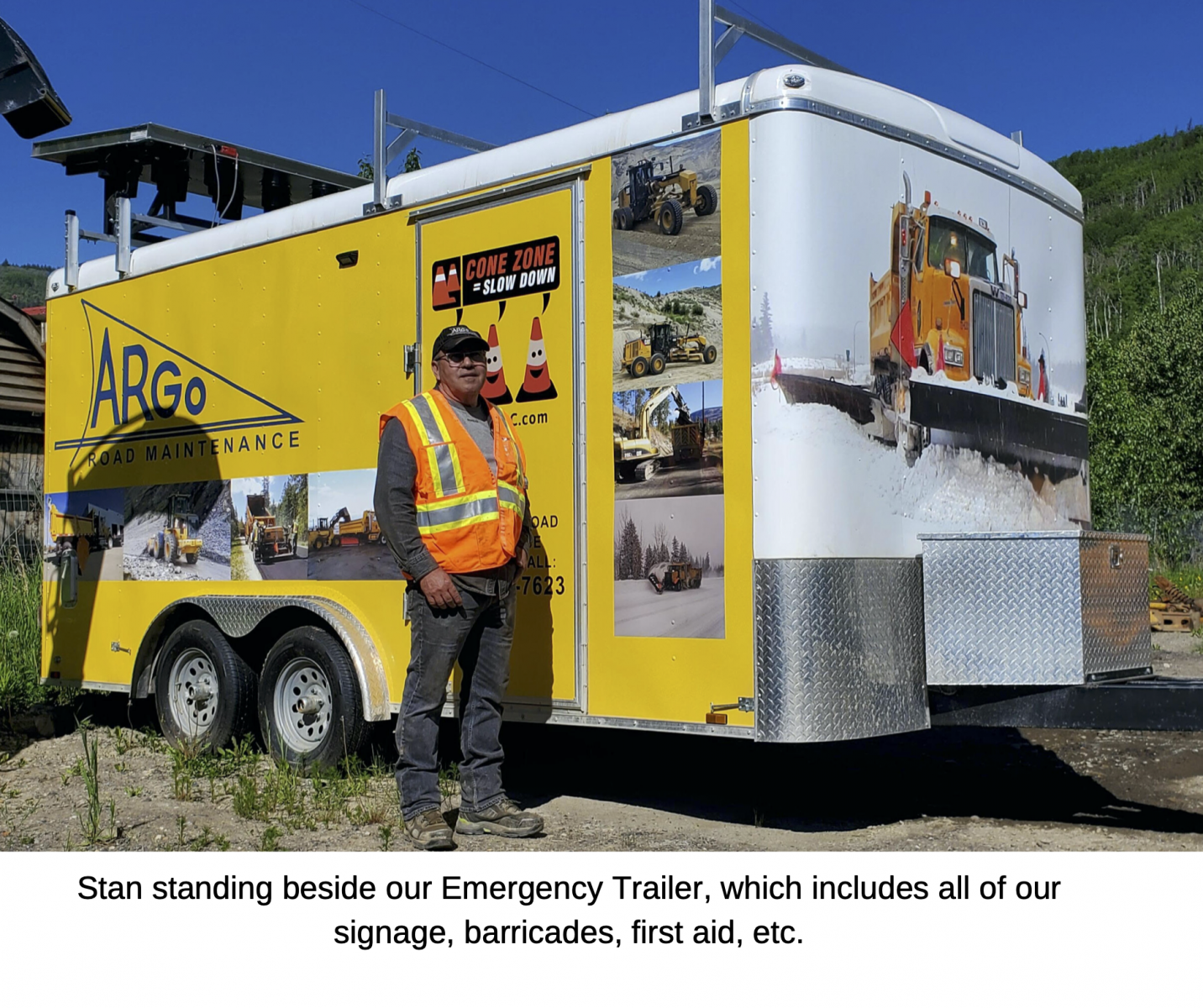 Stan standing beside our Emergency Trailer, which includes all of our signage, barricades, first aid, etc.